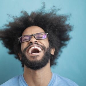 Man laughing to have a Positive Mindset